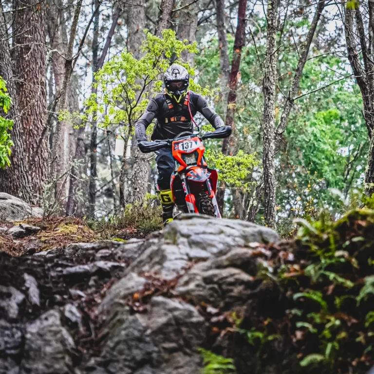 used dirt bikes houstonRider powering through rugged terrain on a high-performance electric dirt bike